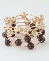 Leopard and gold bead stackable bangle set, stacked view