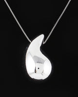 Silver teardrop pendant necklace, close-up of the polished dome pendant