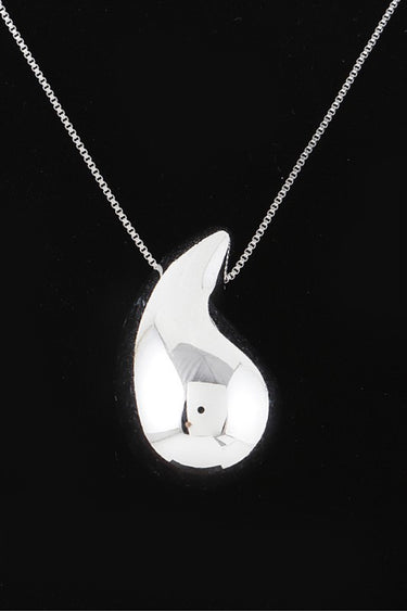 Silver teardrop pendant necklace, close-up of the polished dome pendant