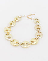 Gold oval cut out link necklace, full flat lay with extender chain