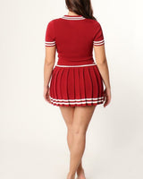 Coordinated red skirt set ready for brunch or evening event