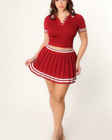 Red skirt set with cropped V‑neck top and matching high‑waisted skirt