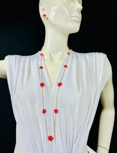 Fuchsia long necklace laid flat – 36″ length and bold color beads