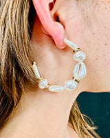 Cream boho earrings with natural cowrie shell detail