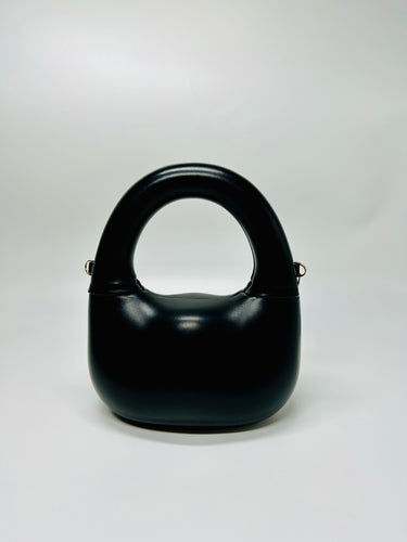 Modern Gleam Handbag in black – sculptural handbag with glossy finish