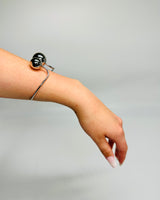 Adjustable open silver cuff with round ball ends
