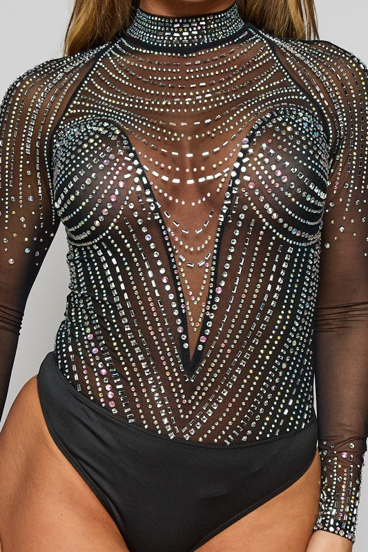 Glamorous sheer black bodysuit with dazzling rhinestone detailing, made to stand out.
