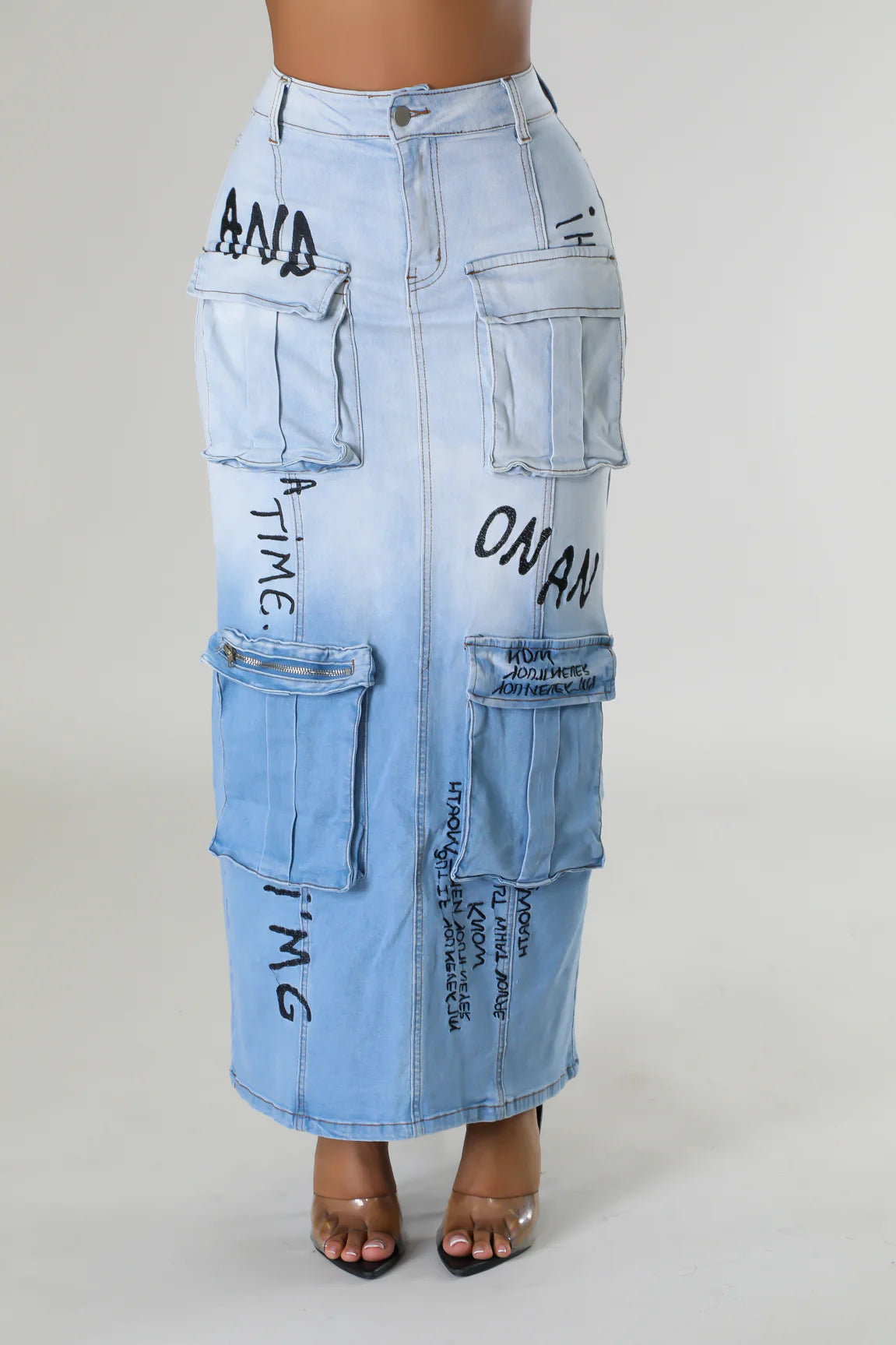 Denim maxi skirt featuring utility pockets and faded details