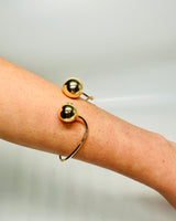Gold cuff bracelet – statement piece modern design with bold open‑cuff shape