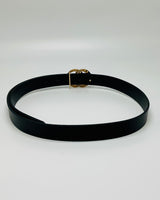 Black waist belt laid flat showing closure design
