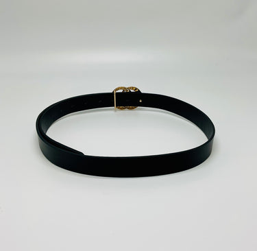Black waist belt laid flat showing closure design