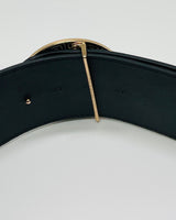 Black elastic fashion belt with gold lion buckle accent