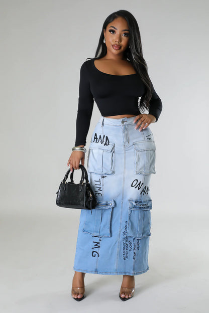 Light blue denim skirt with cargo pocket accents