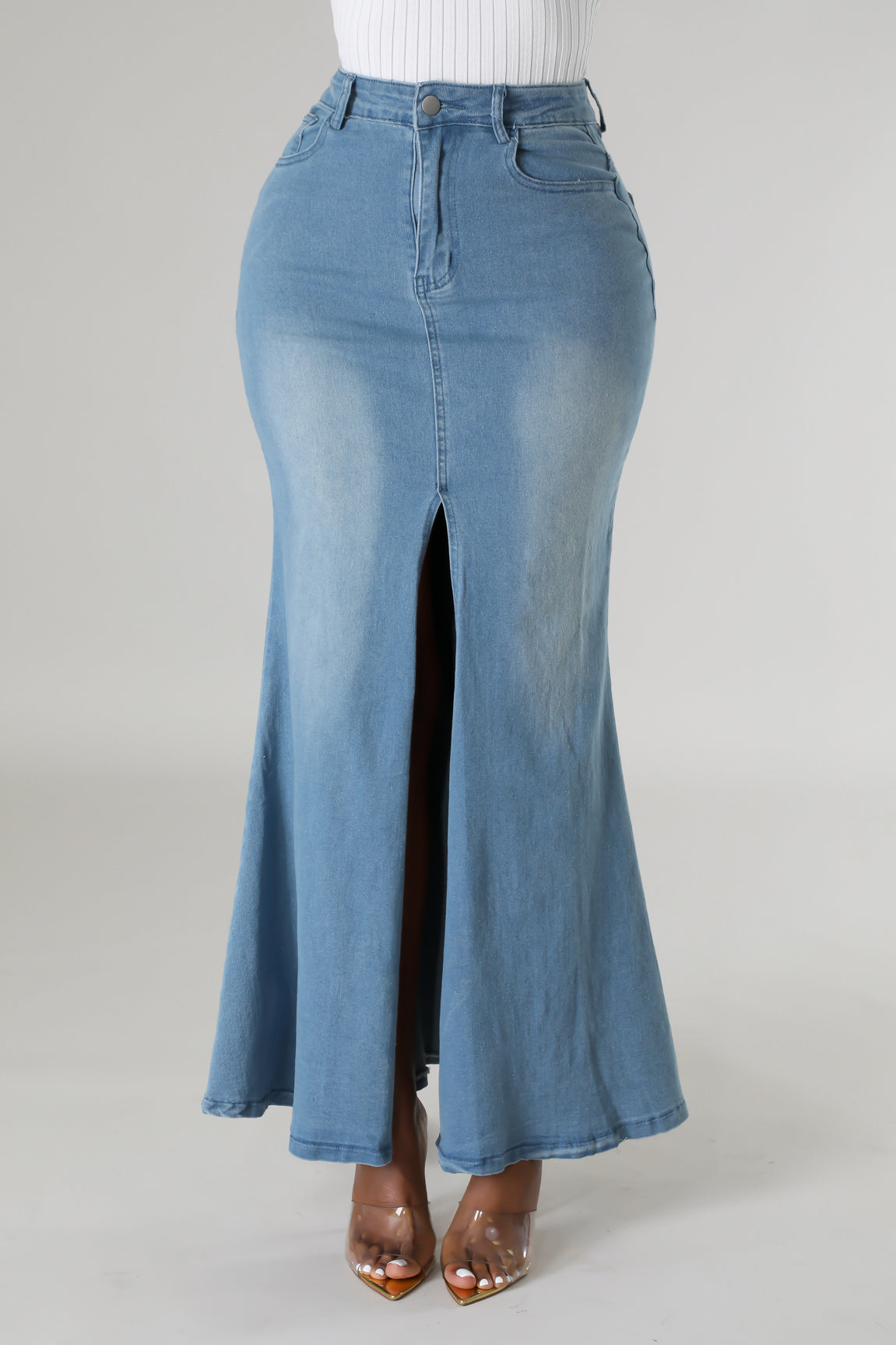 Women's light wash denim maxi skirt with a stylish slit.