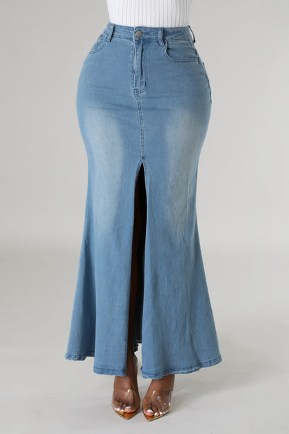 Women's light wash denim maxi skirt with a stylish slit.