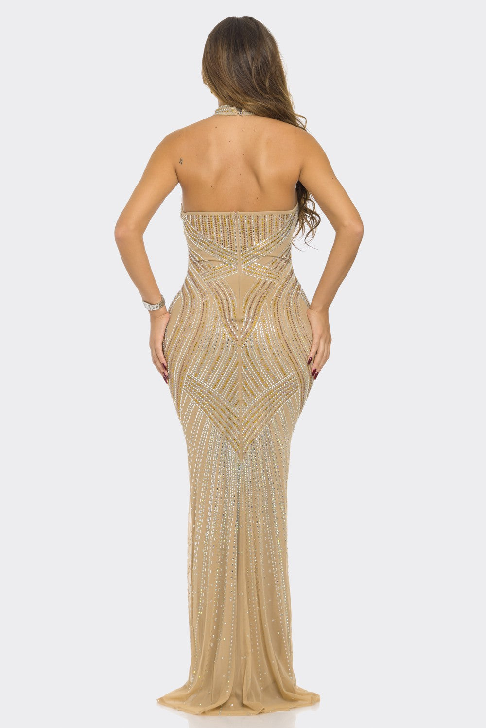 Rhinestone gown with sheer gold mesh and halter neck perfect for formal events.