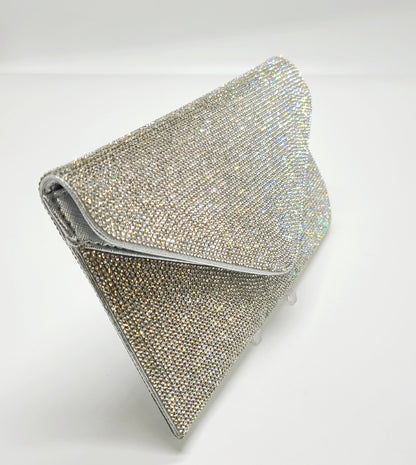 Elegant Silver evening clutch shimmering with crystal rhinestones.
