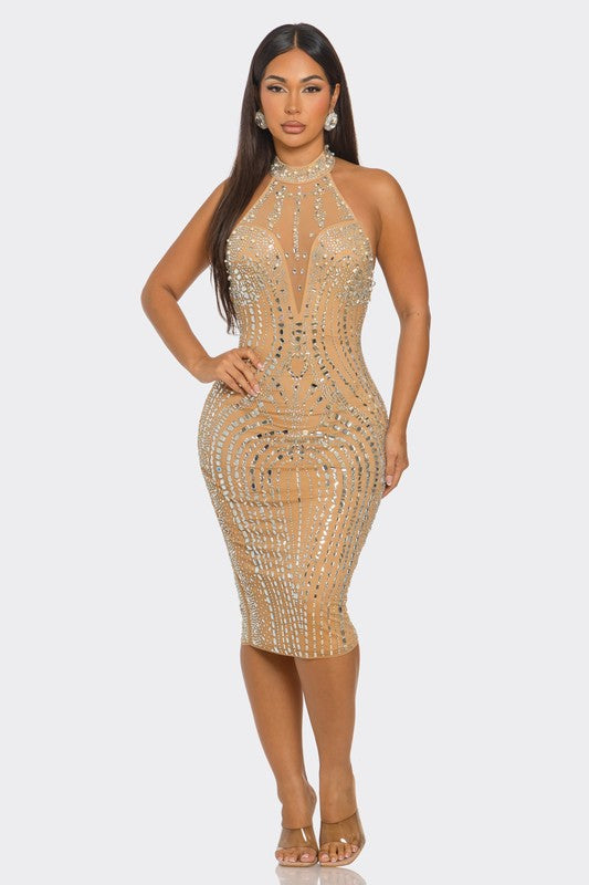 Halter neck nude dress with shimmering diamond-style detailing.