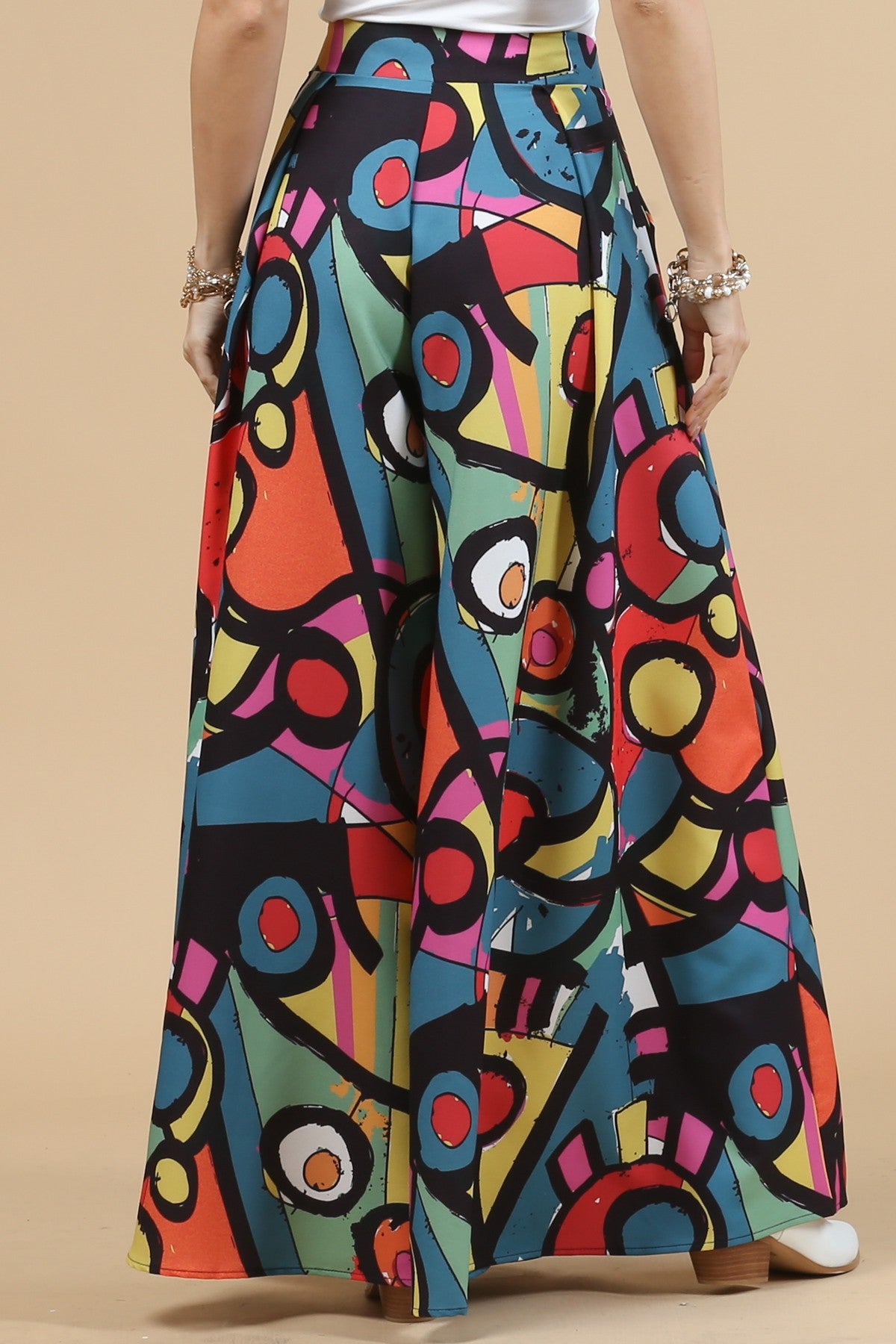 Stylish and comfortable abstract design palazzo pants featuring a flowy silhouette.