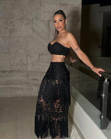 Dazzle in this Black Amaranth Lace Fringe Skirt Set. Perfect for a night out or special occasion.