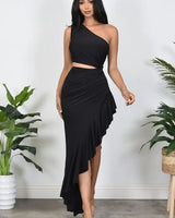Elegant Black cut-out midi dress on model styled for evening