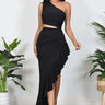 Elegant Black cut-out midi dress on model styled for evening