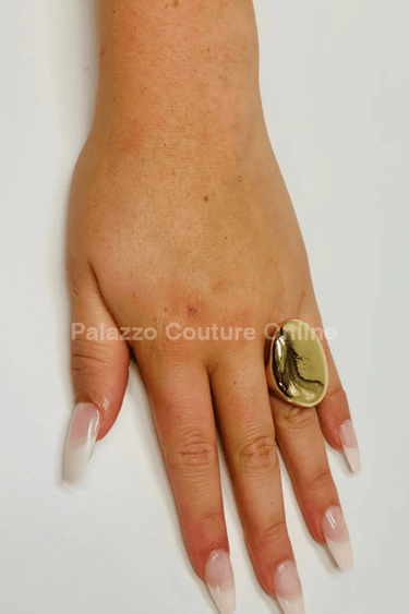Gold statement ring – polished gold finish and bold silhouette