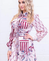Belted Mini Dress – The Opulent Enigma Belted Mini Dress close up detail of elegant design