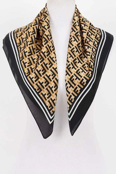 tan and black monogram pattern bandana close-up