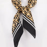 black silk monogram bandana with geometric print flat lay