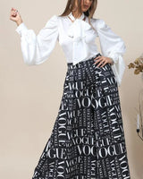 Black Vogue Print Palazzo Pants - front view