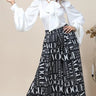 Black Vogue Print Palazzo Pants - front view