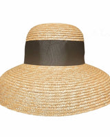 Elegant boho style wide‑brim hat with ribbon band – chic resort wear piece