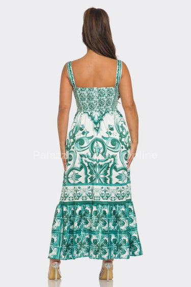 Green and white dress with detailed Mosaic pattern and maxi length.