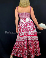 Close‑up of bohemian maxi dress red showing rich mosaic pattern and fabric texture