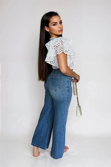Bold Detail Button-Up Wide Leg Jeans close up of wide leg fabric and construction detail