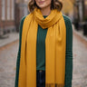mustard cashmere blend shawl draped front view