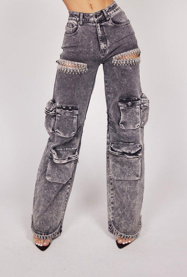 Make a bold fashion statement in these high-rise acid black wash denim jeans with rhinestone fringe detailing