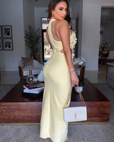 Celestia Sculpted Floral Bandage Gown - Yellow side view highlighting floor-length hemline