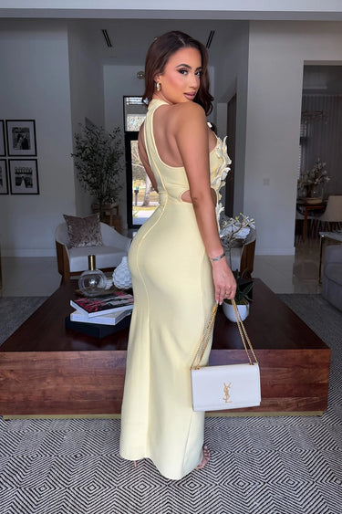 Celestia Sculpted Floral Bandage Gown - Yellow side view highlighting floor-length hemline