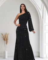 Celestial One Shoulder Gown in Black with Shimmer Finish close up detail of one shoulder design and fabric