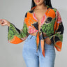 Charity Babe Printed Tie Top with Plunging Neckline and Long Sleeves front view showing long sleeve design