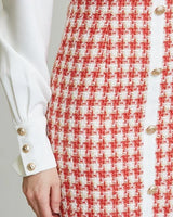 Elegant White/Red elegant mini dress on model styled for going out