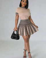 Classy Girl Knit Skirt Set – Taupe Pleated Two-Piece Outfit close up of pleated top design and fabric