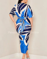 Coastal Knot Ruched Skirt Set - Blue side view showing skirt silhouette and fit