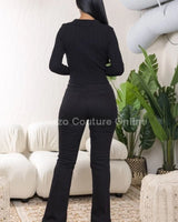 Women's Black long sleeve top cutout style back view