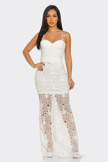 Turn heads in the Crochet Glam Ring Maxi Dress! Featuring a sculpted bustier bodice