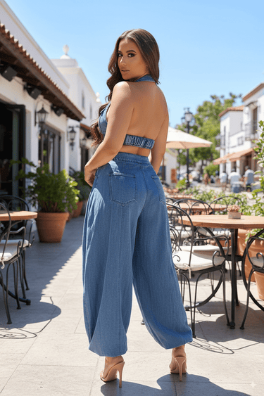 Woman wearing a trendy denim jumpsuit outdoors for a chic casual look