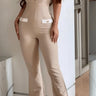 Dinner Date Beige Jumpsuit with Deep V Neckline and Flared Leg for women - stylish jumpsuit by Palazzo Couture