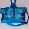Turquoise Handbag in metallic genuine leather with top handle and shoulder strap